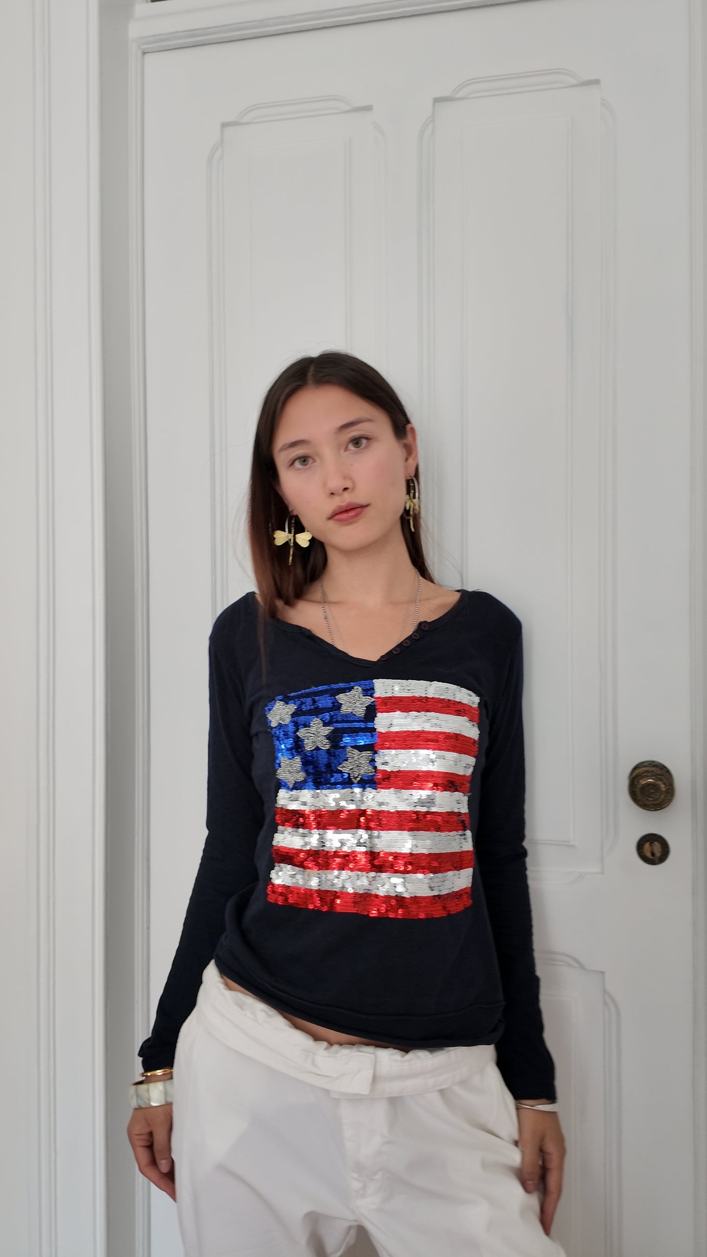 Navy blue long sleeve top with sequin USA flag detail size M