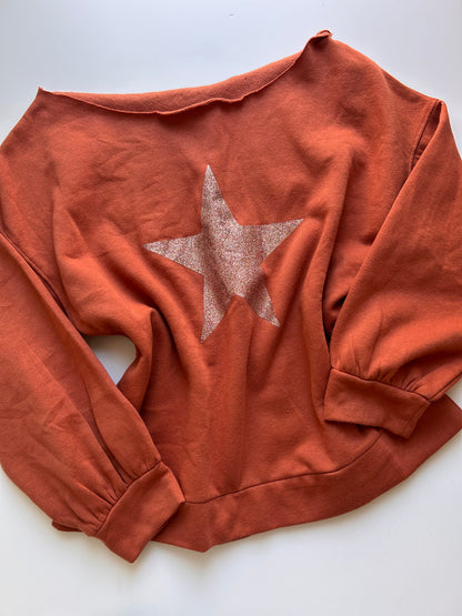 Adorable off the shoulder sweater with star detail size L/XL