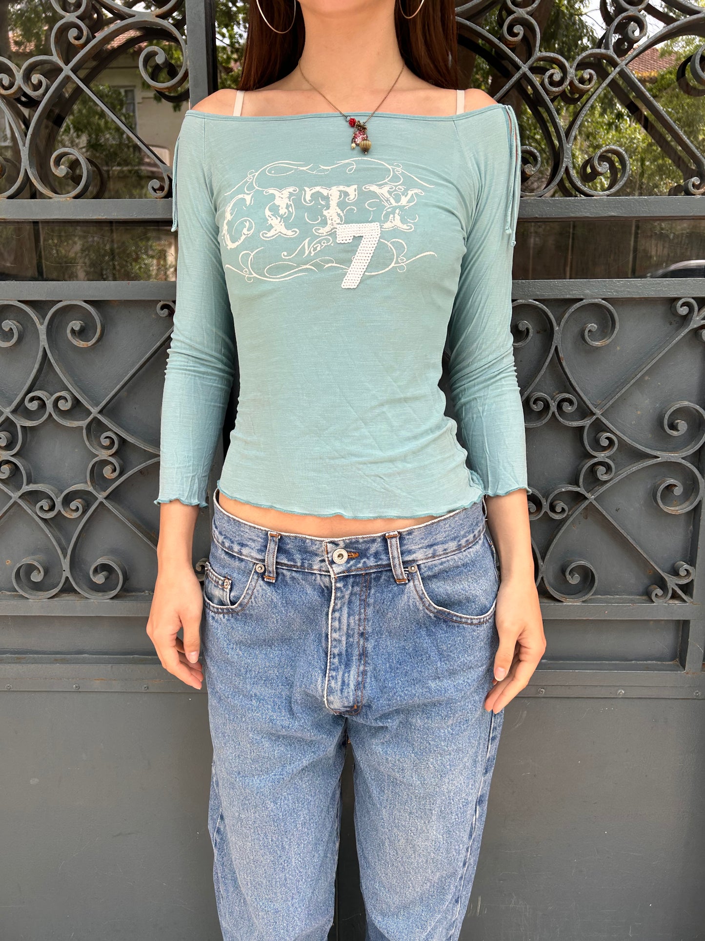Size S Iconic y2k long top