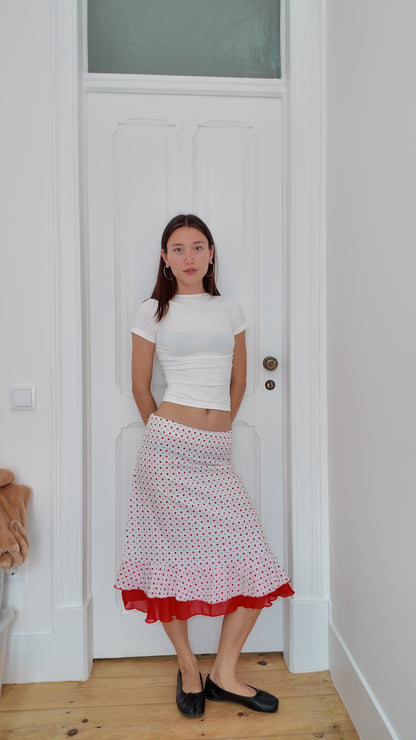 Midi white skirt with red dots and ruffle detail at the bottom size 38