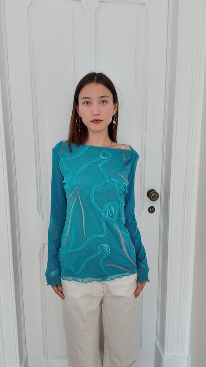 Iconic long sleeve blue top with rose detail size M/L