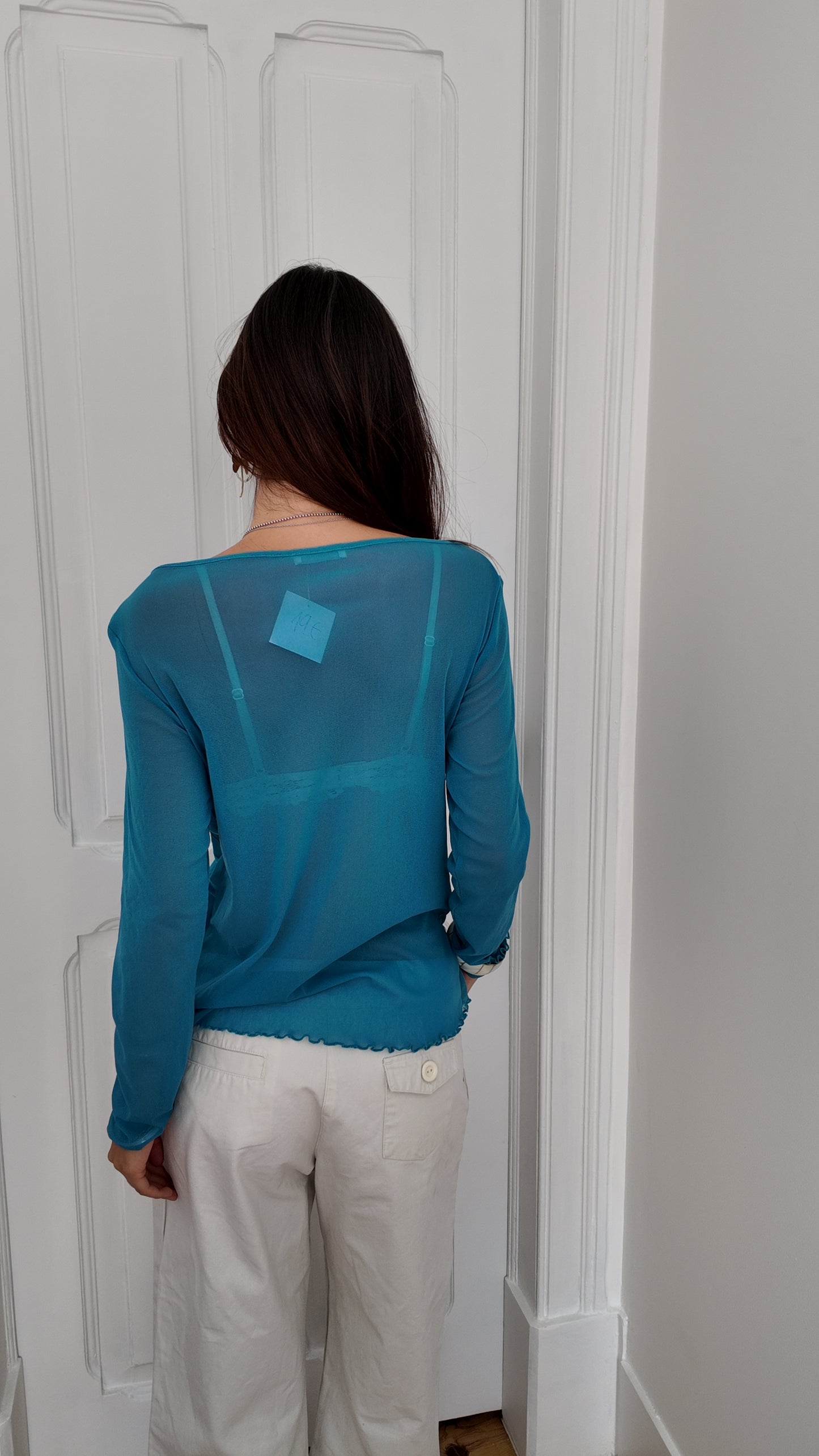 Iconic long sleeve blue top with rose detail size M/L