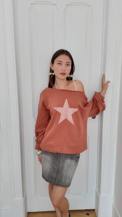 Adorable off the shoulder sweater with star detail size L/XL
