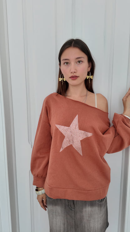 Adorable off the shoulder sweater with star detail size L/XL