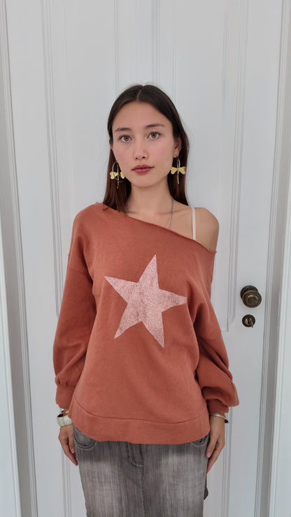 Adorable off the shoulder sweater with star detail size L/XL