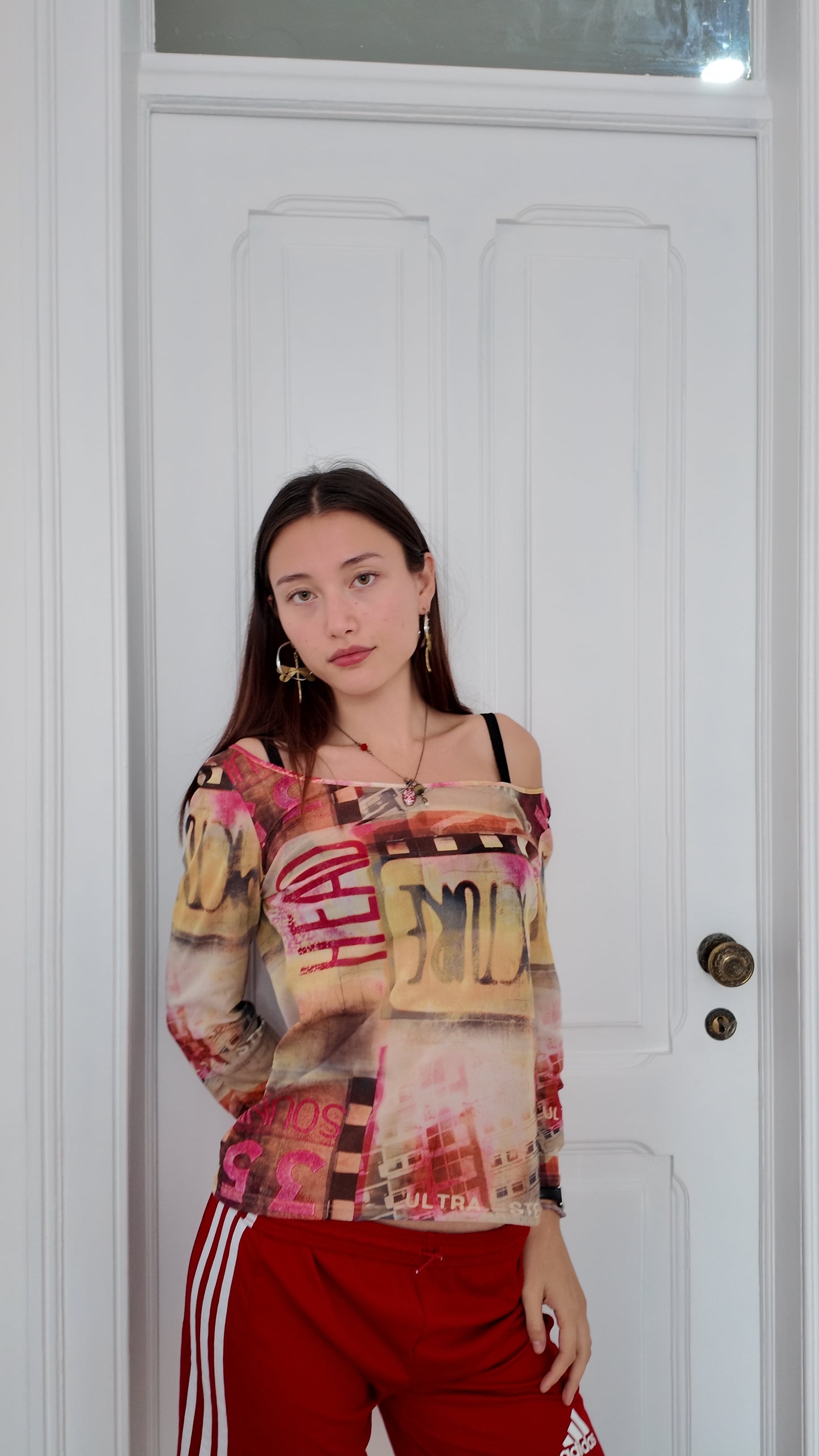 Adorable sheer graphic top size M/L