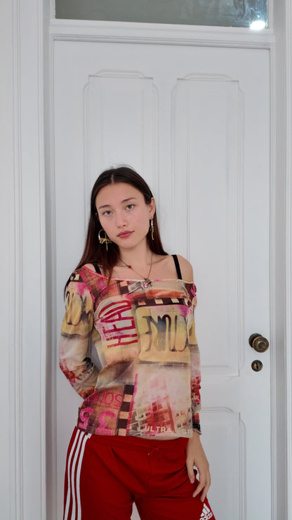 Adorable sheer graphic top size M/L